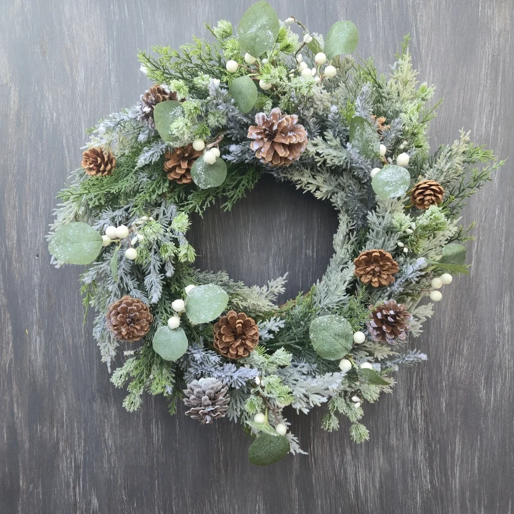 Handmade lush, artificial Winter Greenery Wreath With White And Brown Accents